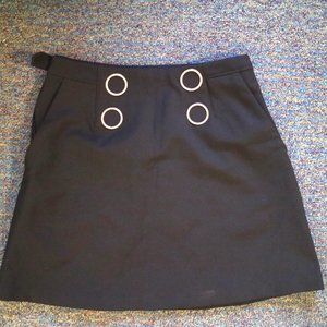 Cute short skirt - black with golden circle design in front